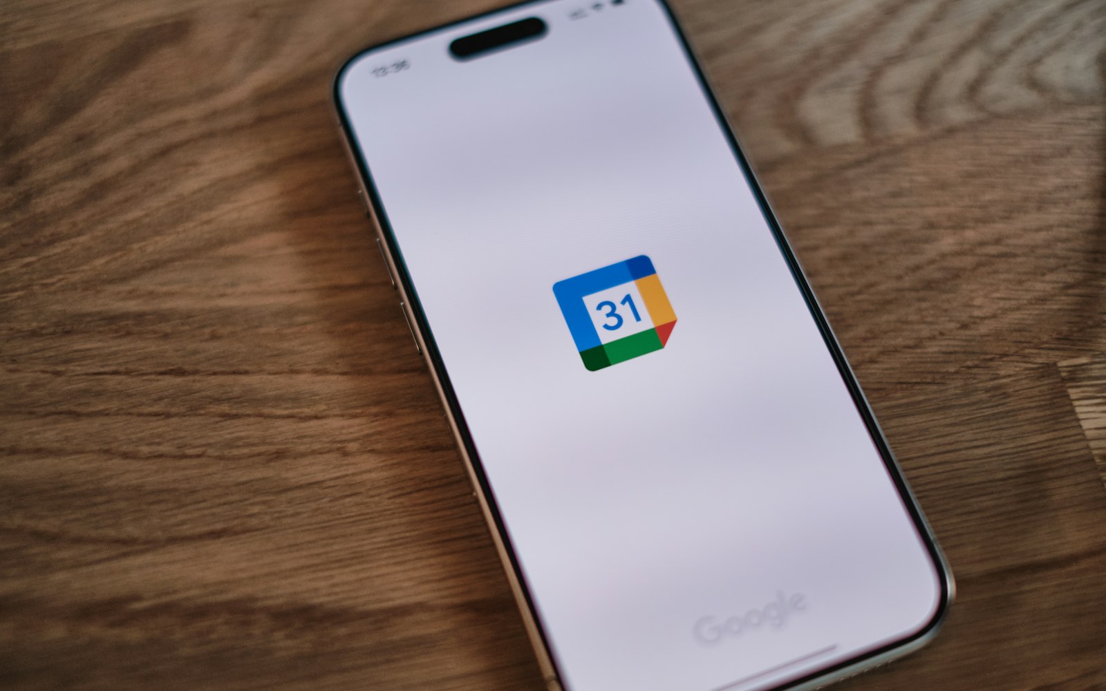 A phone showing the Google Calendar app icon